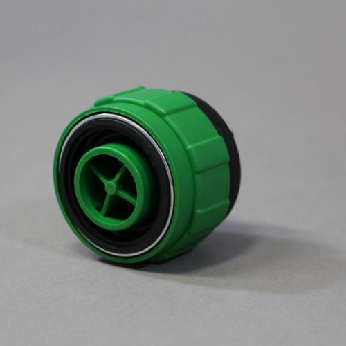 Adapter SMART Ventil Quick Connect aus Kunststoff in grün-schwarz.