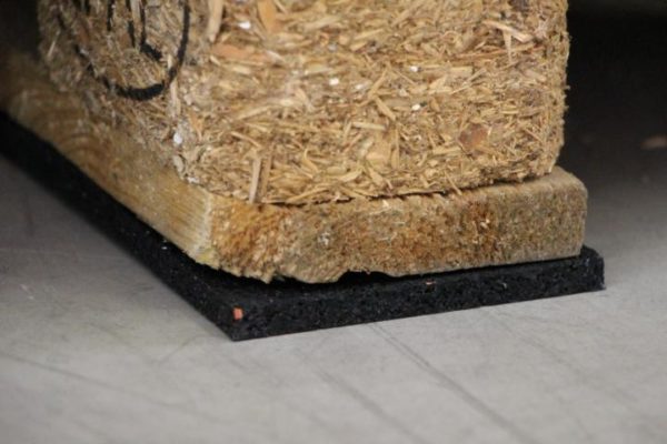 An anti-slip mat under a pallet secures it from slipping. | Transport of building materials | Transport of metal products