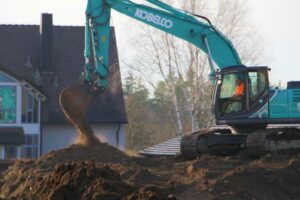 Excavator at new construction of Rothschenk logistics center