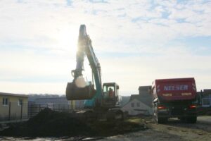 Excavator at the new construction of the Rothschenk logistics center